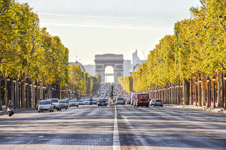 PARIS, FRANCE - SEPTEMBER 9: The Champs-Elysees and the Arc de Triomphe, on September 09, 2012 in Paris, France. The most famous street of Paris has 1910m and is full of stores, cafés and restaurants.
